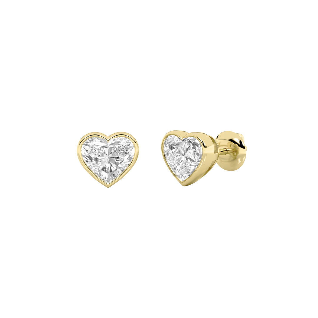1Cttw Heart Shaped Lab Grown Diamond (G/VS) BezelSet Stud Earrings in 14K Gold