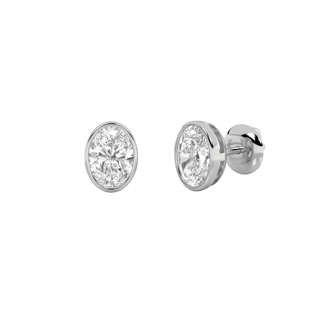 1Cttw Oval Shaped Lab Grown Diamond (F/VS) Bezel Set Stud Earrings in 14K Gold