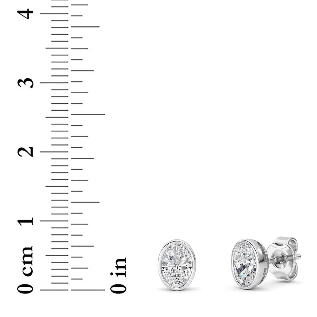 1Cttw Oval Shaped Lab Grown Diamond (F/VS) Bezel Set Stud Earrings in 14K Gold