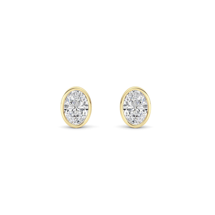 1Cttw Oval Shaped Lab Grown Diamond (F/VS) Bezel Set Stud Earrings in 14K Gold