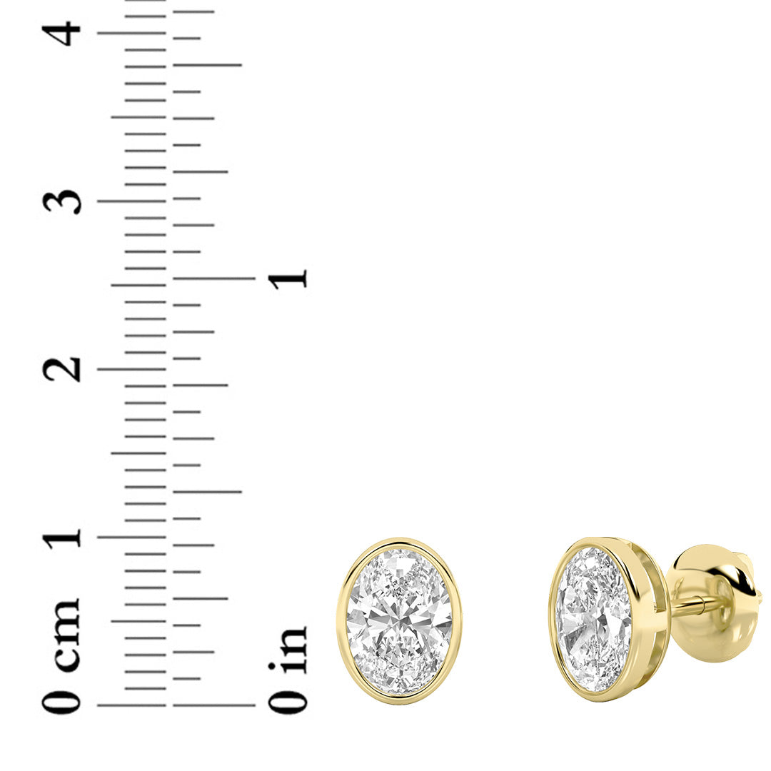 1Cttw Oval Shaped Lab Grown Diamond (G/VS) Bezel Set Stud Earrings in 14K Gold