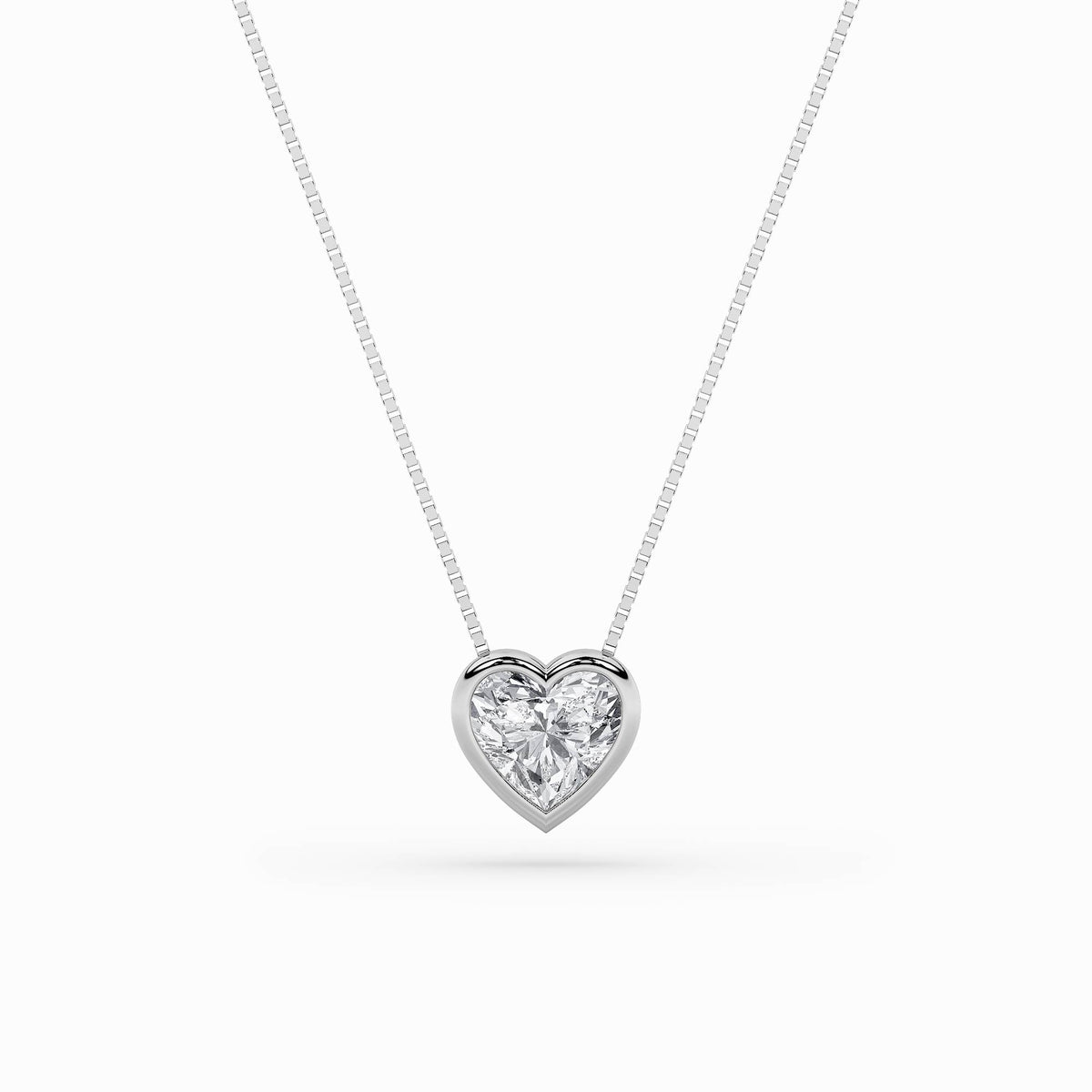 1Cttw Heart Shaped Lab Grown Diamond (F/VS) BezelSet Solitaire Pendant in 14K Gold