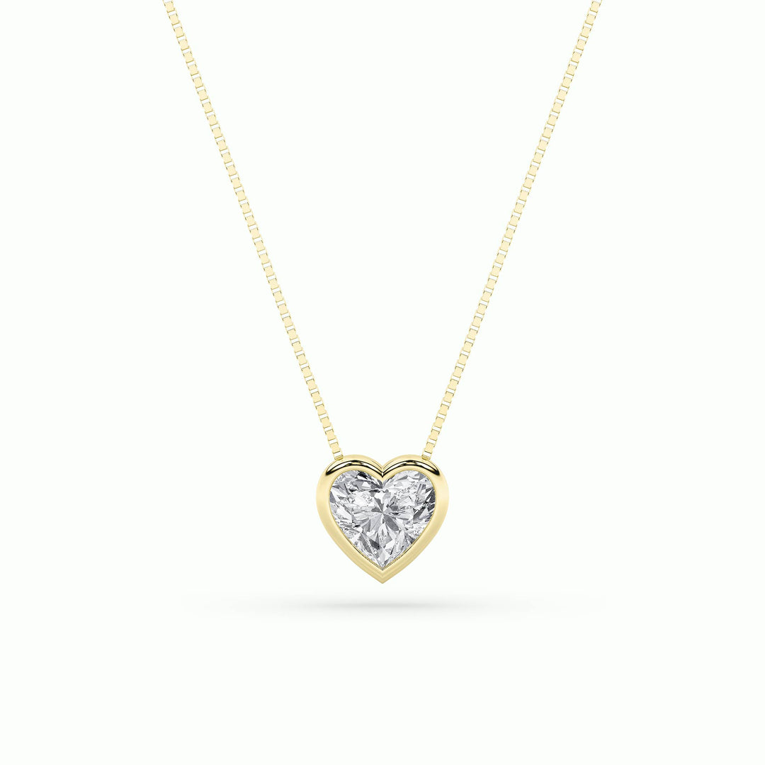 1Cttw Heart Shaped Lab Grown Diamond (F/VS) BezelSet Solitaire Pendant in 14K Gold