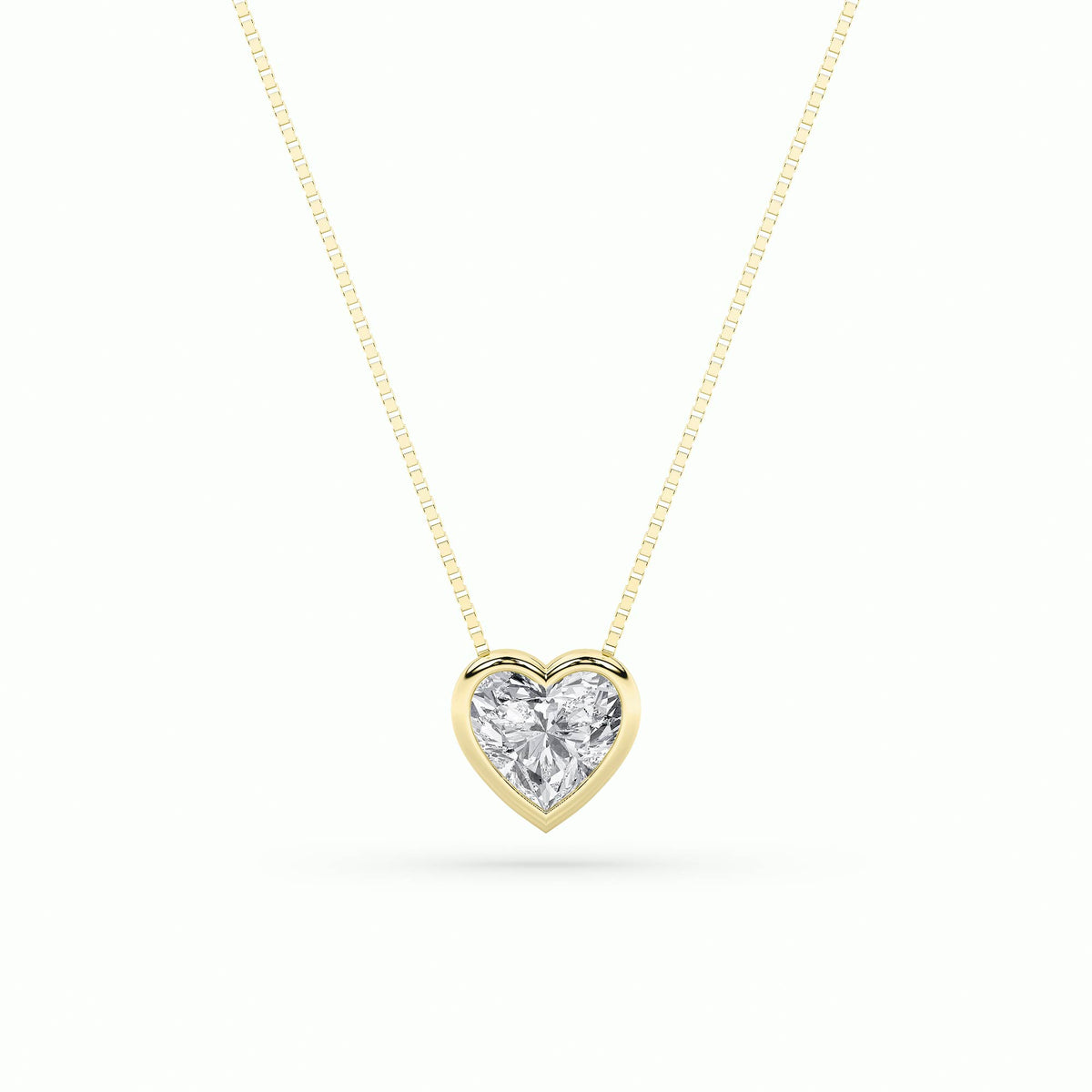 1Cttw Heart Shaped Lab Grown Diamond (F/VS) BezelSet Solitaire Pendant in 14K Gold