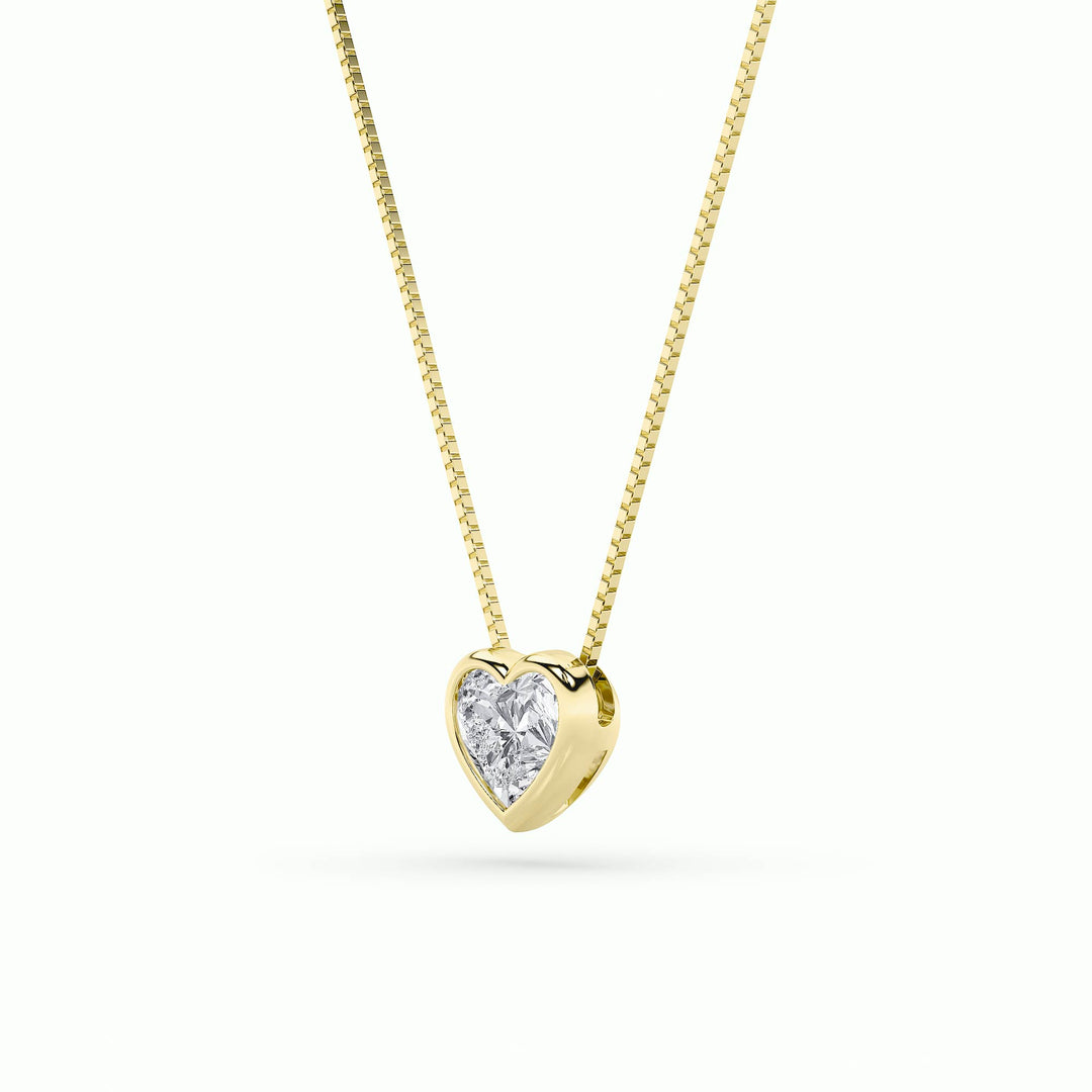 1Cttw Heart Shaped Lab Grown Diamond (F/VS) BezelSet Solitaire Pendant in 14K Gold